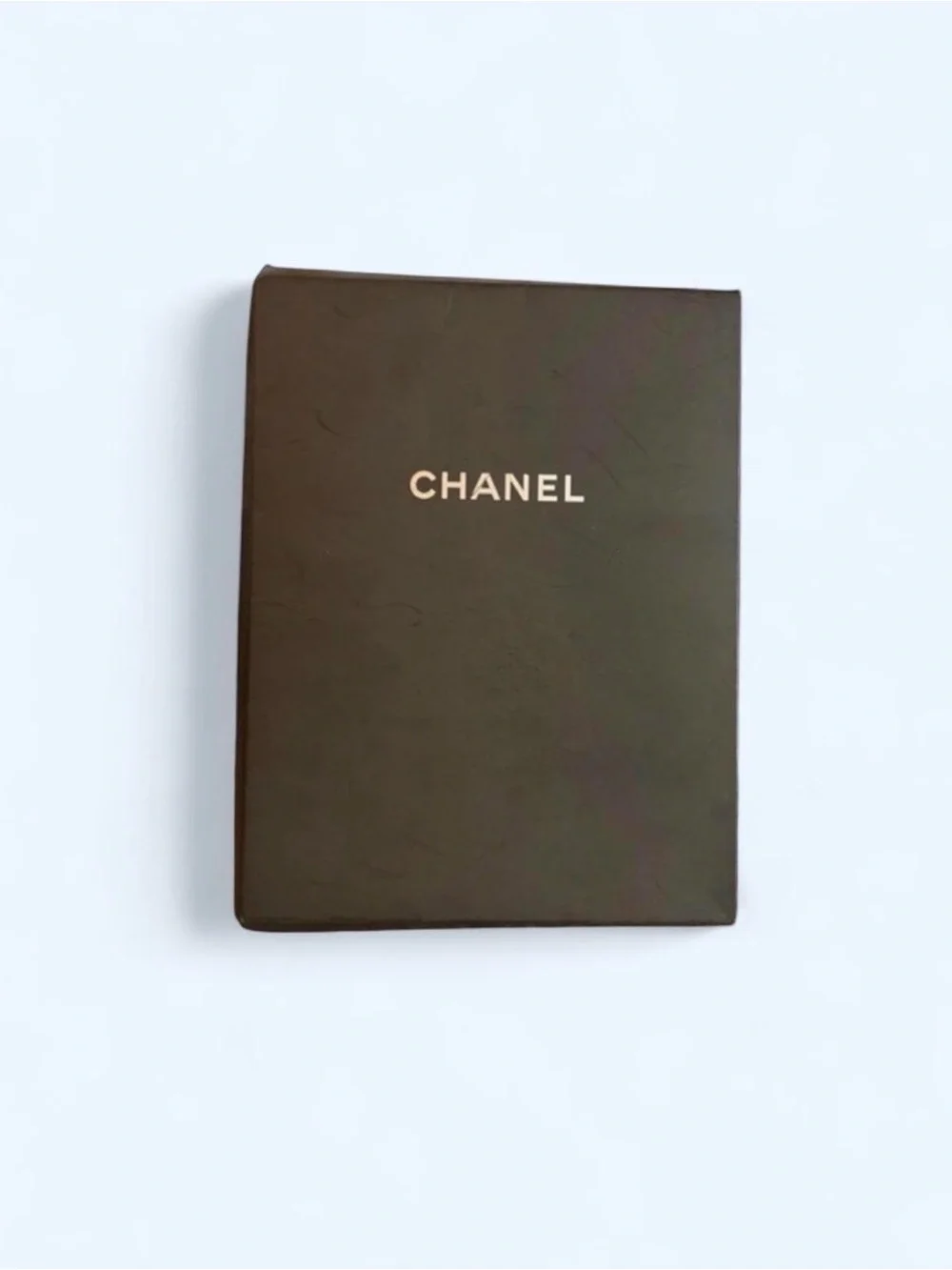 Vintage Chanel pattern tights in tan and black